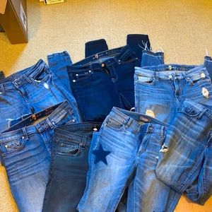 7 pairs of size 26 jeans